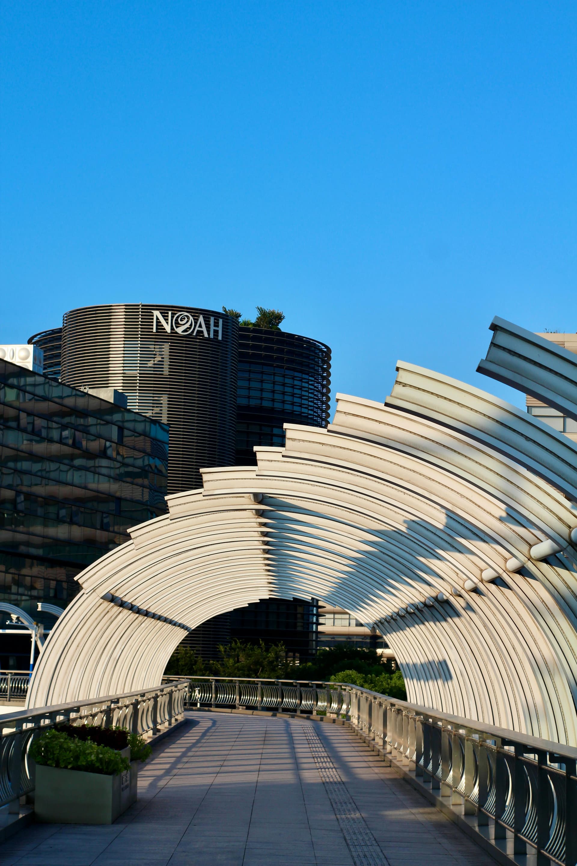 Traditional Chinese architecture with ornate rooftops against mountain backdrop