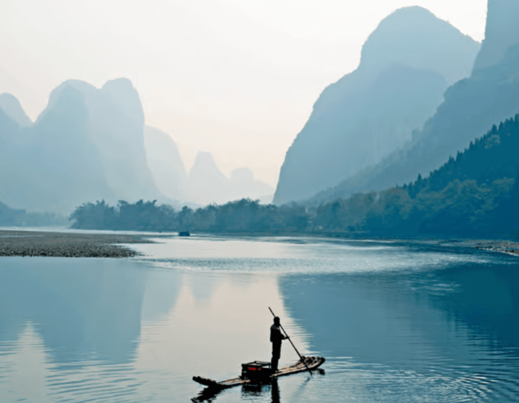 Li River in Guilin with iconic karst limestone mountains and traditional fishing boats